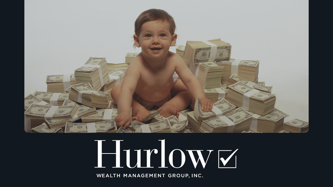 Baby sitting on a pile of money