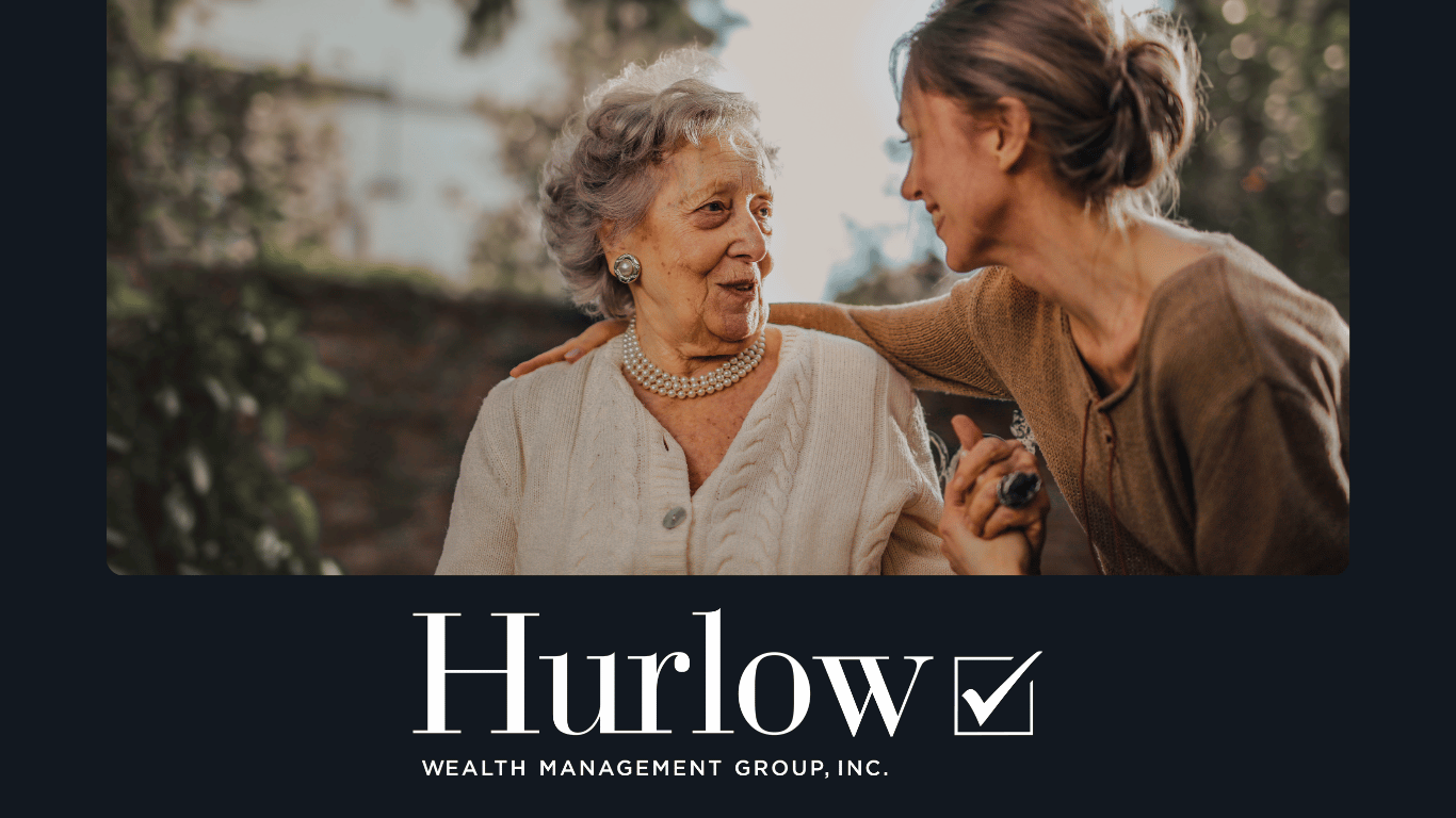 Elderly woman with her daughter sitting outside