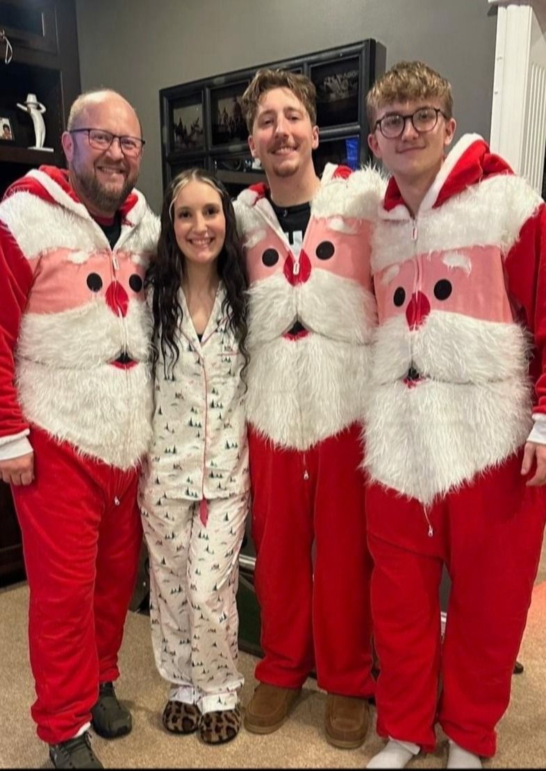 John Hurlow and his family in Christmas onesies